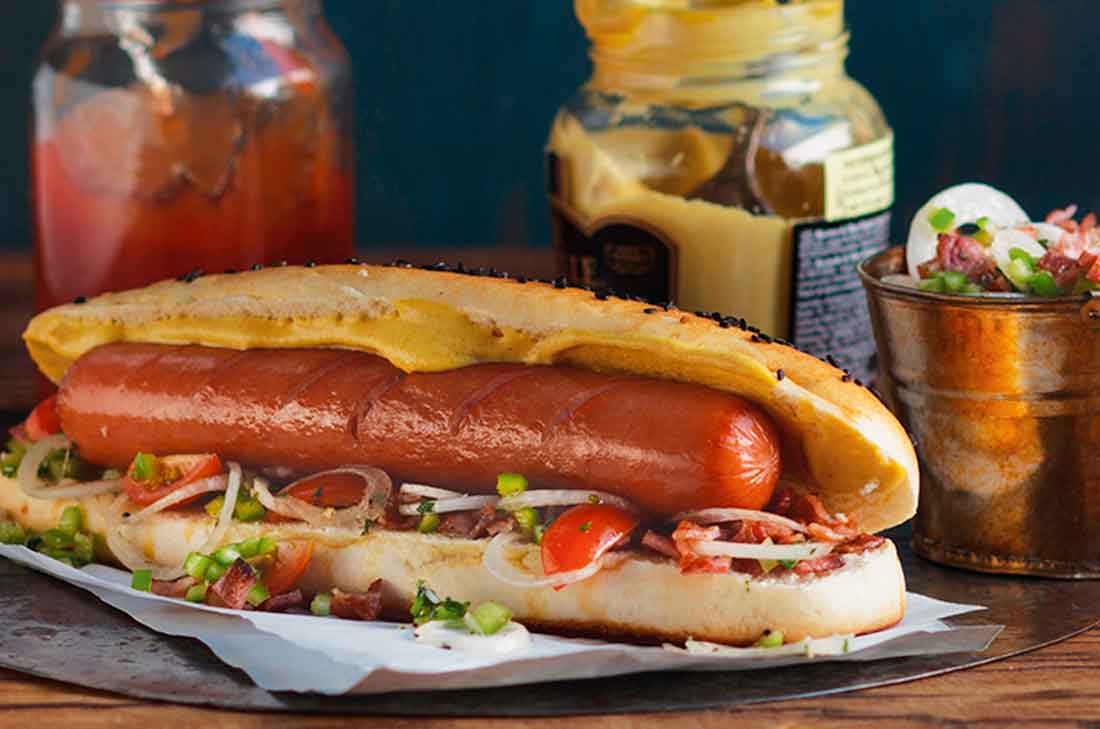 Receta de Hot dog acompañado de pico de gallo con tocino