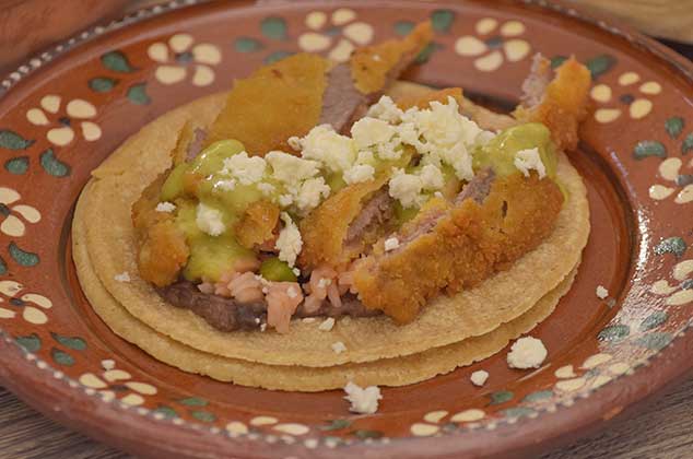 Tacos acorazados de arroz con milanesa