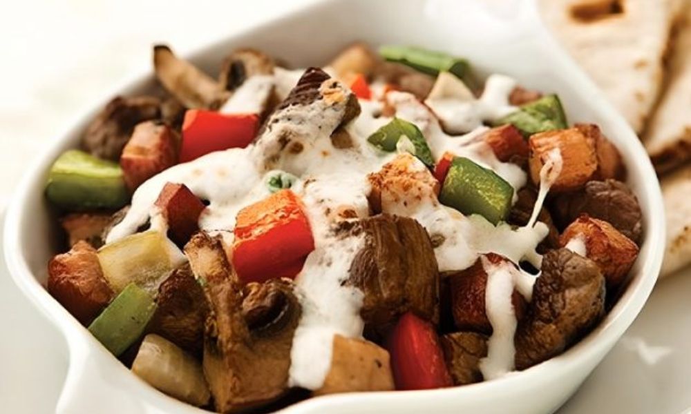 Receta de alambre de res con queso oaxaca